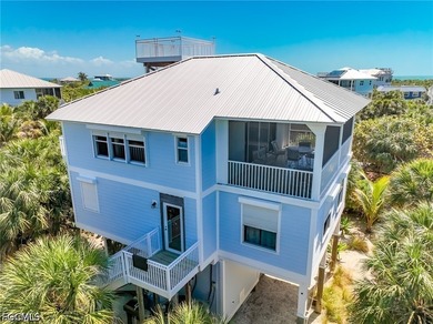 Elevated Living, Gulf Views & Rooftop Sunsets Imagine pulling up - photo 1