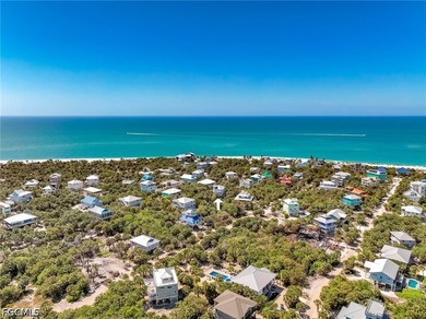 Elevated Living, Gulf Views & Rooftop Sunsets Imagine pulling up - photo 8