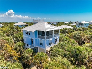 Elevated Living, Gulf Views & Rooftop Sunsets Imagine pulling up - photo 10