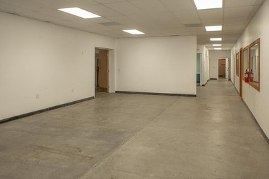 Large Commercial Location with Two Buildings and Paved Parking - photo 31