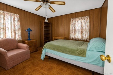 Set on a 60x100 lot in The Forest City section of Wantagh in - photo 17