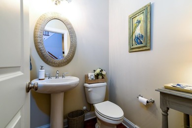 This beautiful brick, two-story home in Cedar Grove sits on a - photo 7