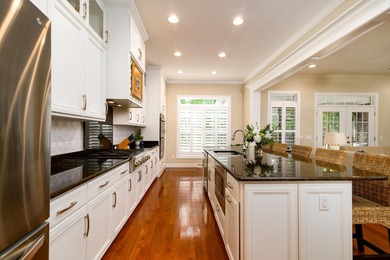 This beautiful brick, two-story home in Cedar Grove sits on a - photo 8