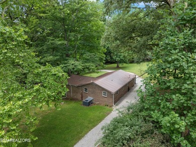 Charming brick cottage with seasonal lake views on 2.36 - photo 14