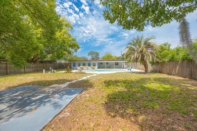 Ready for its next owner, this four-bedroom, two-bath concrete - photo 31