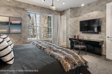 This stunning Maroon Creek townhome has been completely