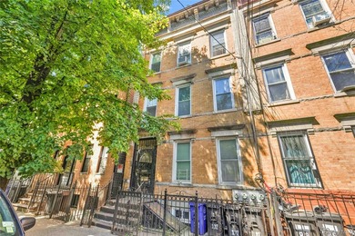 Presenting 192 Hale Avenue - a solid three-family home with a - photo 1