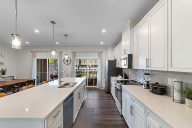 Located inside the gated community of Dye Estates Townhomes at - photo 3