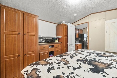 Escape to your own slice of paradise in the sought-after, gated - photo 13