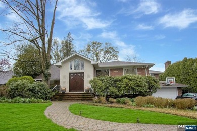 New Price Offering! Nestled on a quiet, tree-lined street, this - photo 2