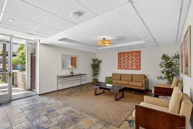 Welcome to this unique top-floor corner unit in the vibrant - photo 4