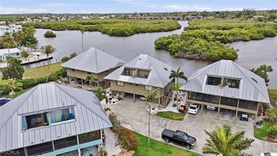 Waterfront living, private dock, boat lift, and direct access to - photo 8