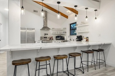 Experience contemporary mountain living in this fully renovated - photo 11