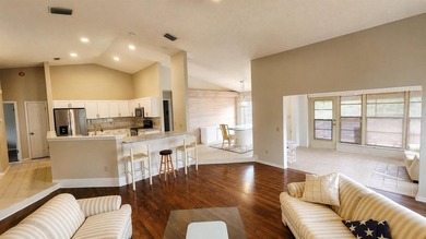 Welcome to this beautifully restored former model home, tucked - photo 4