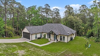 Beautifully designed 3-bedroom, 2.5-bath home backing up to the - photo 2