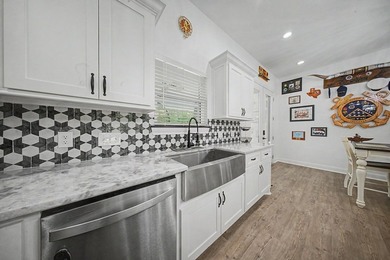 Beautifully designed 3-bedroom, 2.5-bath home backing up to the - photo 5