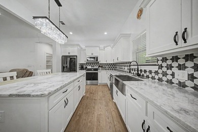 Beautifully designed 3-bedroom, 2.5-bath home backing up to the - photo 6