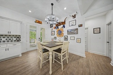Beautifully designed 3-bedroom, 2.5-bath home backing up to the - photo 7