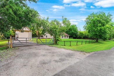Set on a beautifully manicured and fenced 1.15-acre lot, this - photo 6