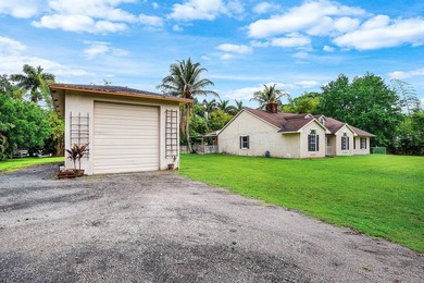 Set on a beautifully manicured and fenced 1.15-acre lot, this - photo 10