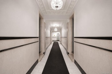 Perched on the top floor of a charming and meticulously - photo 3