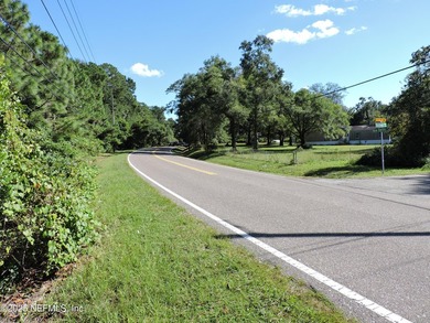 7.77 contiguous acres in 4 tracts with several hundred feet of - photo 1