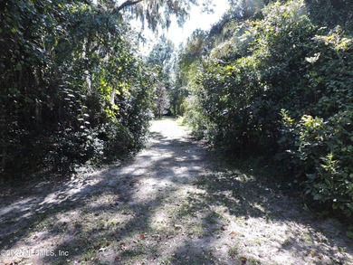 7.77 contiguous acres in 4 tracts with several hundred feet of - photo 7