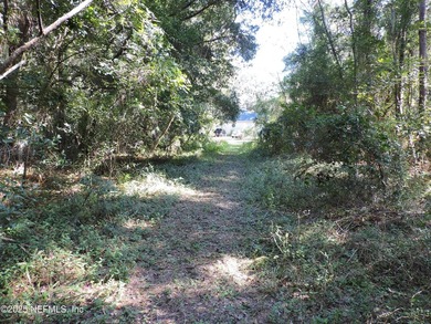 7.77 contiguous acres in 4 tracts with several hundred feet of - photo 10