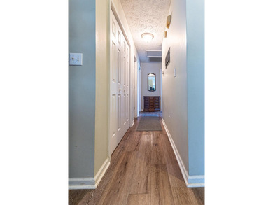 This well-maintained 3-bedroom, 2-bath home offers comfortable - photo 2