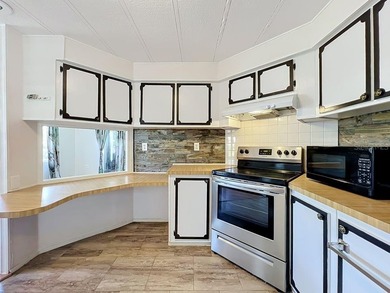 Welcome to this beautifully updated 2-bedroom, 2-bath home - photo 5