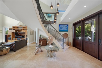 Welcome to Serenity Cay, an exquisite Balinese-inspired estate