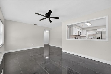 Welcome to Woodlawn Terrace. This 3-bedroom, 1.5-bathroom home - photo 6