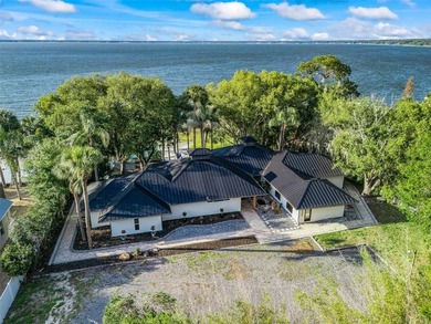 Discover an extraordinary waterfront retreat on beautiful Lake - photo 5