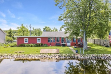 This 2-BD 2-BA 1,200-sq-ft home on a .28-acre lot w/ 90 ft of - photo 1