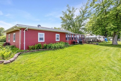 This 2-BD 2-BA 1,200-sq-ft home on a .28-acre lot w/ 90 ft of - photo 2