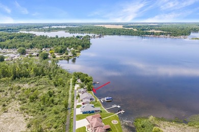 This 2-BD 2-BA 1,200-sq-ft home on a .28-acre lot w/ 90 ft of - photo 5