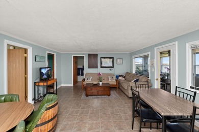 This 2-BD 2-BA 1,200-sq-ft home on a .28-acre lot w/ 90 ft of - photo 9