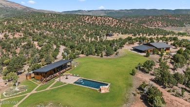 STUNNING LUXURY RETREAT! This captivating legacy ranch is just - photo 2