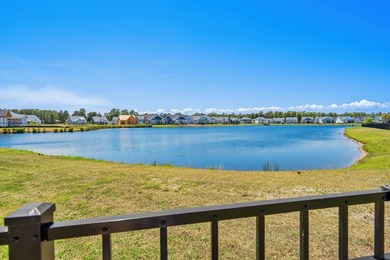 Look No Further! Tucked along the lakefront in the gated - photo 2