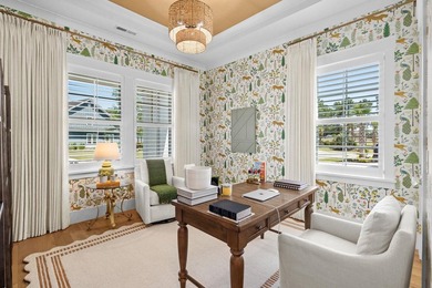 Look No Further! Tucked along the lakefront in the gated - photo 9