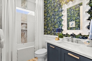 Look No Further! Tucked along the lakefront in the gated - photo 10