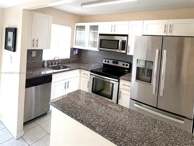 Lake Condo For Sale in Sunrise, Florida