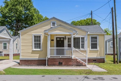 Full of charm, natural light, and future potential, this updated - photo 1