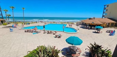 Experience the ultimate beachside lifestyle in this beautifully - photo 3