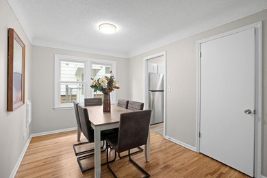 Fresh renovations and a thoughtful layout make this 3-bedroom - photo 4