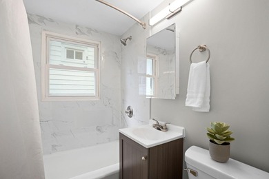Fresh renovations and a thoughtful layout make this 3-bedroom - photo 7