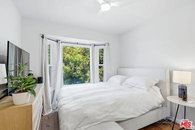 Beautifully updated coastal residence featuring 4 bedrooms, 2 - photo 12