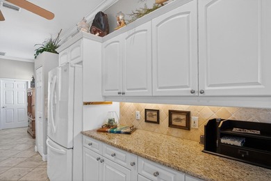 Beautiful 3/2/2/ pool home situated on the golf course with - photo 12