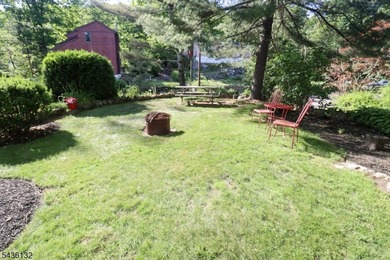 Charming custom-built Cape Cod home nestled on a prime corner - photo 24