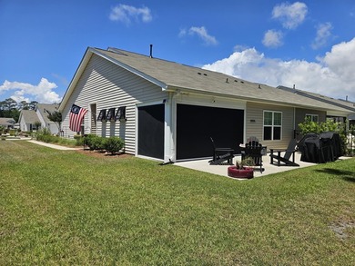 Situated in the Towns at Heather Glen community, this light and - photo 3